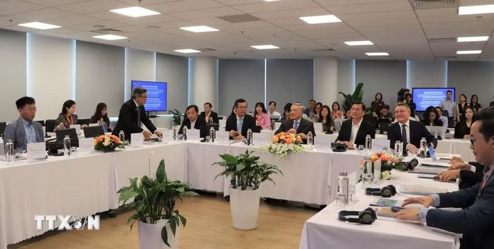 Khóa đào tạo Nhà quản lý Trung tâm Tài chính quốc tế với chủ đề: “Thiết kế sản phẩm tài chính và thu hút vốn đầu tư tại Trung tâm Tài chính Quốc tế”. (Ảnh: Huyền Trang/TTXVN)