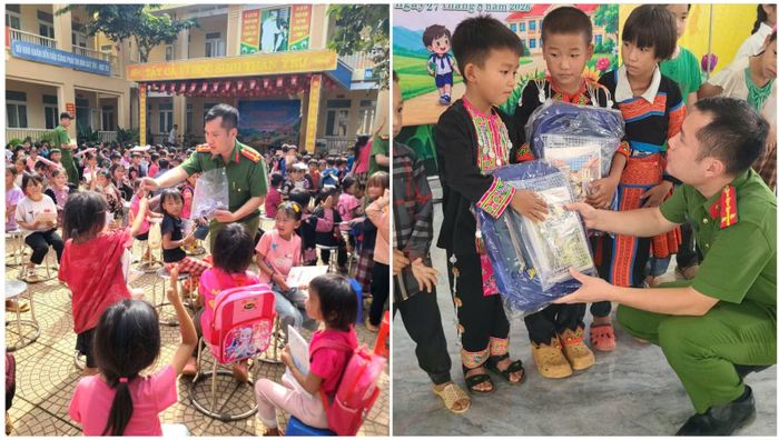 Đại úy Vì Văn Nam, Trưởng Công an xã Pà Cò trao tặng các phần quà đến các em học sinh.