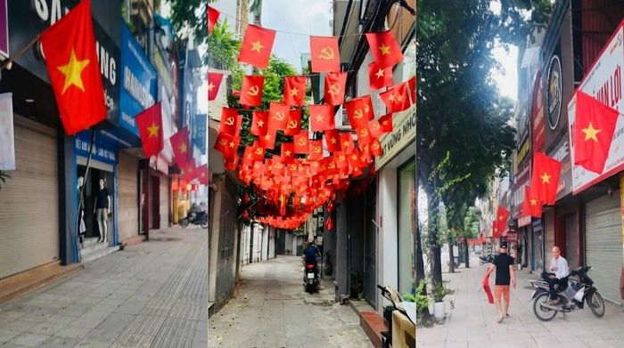 Sắc cờ rực rỡ trong từng con ngõ nhỏ, tạo không khí hân hoan chào mừng ngày lễ lớn. Ảnh: HT