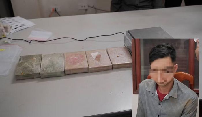 Đối tượng Đàm Văn Hưng cùng tang vật thu giữ - Ảnh: Công an tỉnh Cao Bằng.
