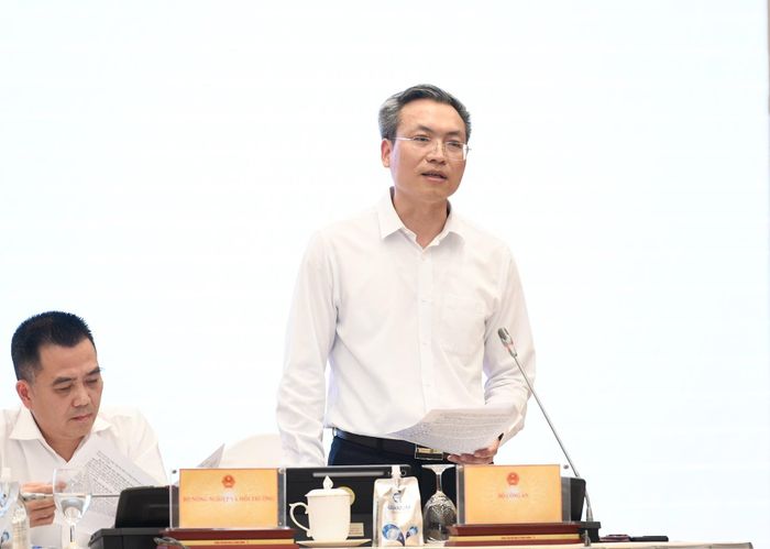 Thiếu tướng Nguyễn Quốc Toản, Chánh Văn phòng, người phát ngôn Bộ Công an tại họp báo chiều nay. Ảnh: Như Ý