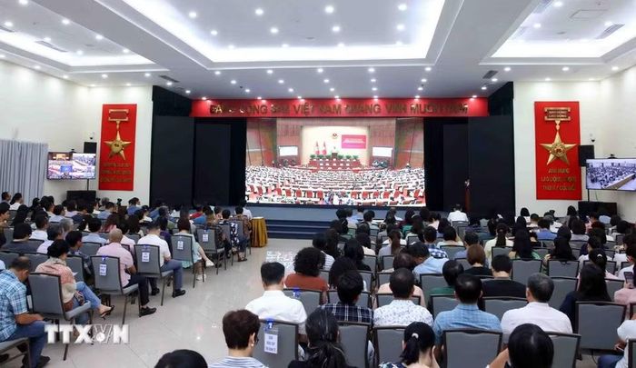 Đảng viên thuộc Đảng bộ Thông tấn xã Việt Nam tham dự Hội nghị trực tuyến tại điểm cầu trụ sở Thông tấn Quốc gia (5 Lý Thường Kiệt, Hà Nội). (Ảnh: Phạm Kiên/TTXVN)