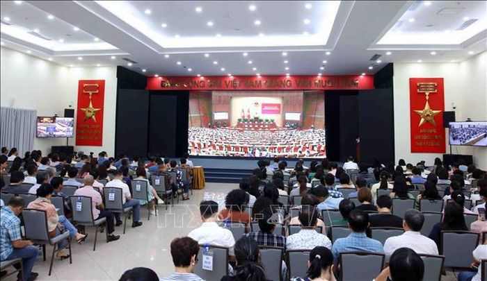 Đảng viên thuộc Đảng bộ Thông tấn xã Việt Nam tham dự Hội nghị trực tuyến tại điểm cầu trụ sở Thông tấn Quốc gia (5 Lý Thường Kiệt, Hà Nội). Ảnh: Phạm Kiên/TTXVN