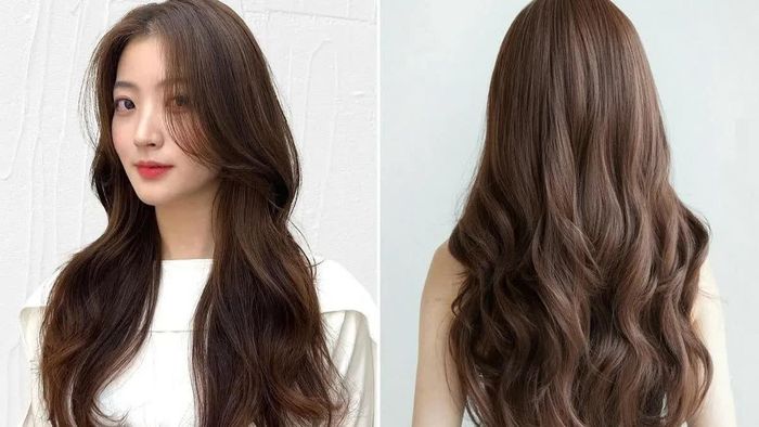 Tóc xoăn gợn sóng kết hợp layer mang đến vẻ thanh lịch, nữ tính và có phần sang trọng