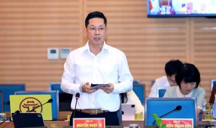 Giám đốc Sở Tài chính Hà Nội Nguyễn Ngọc Tú báo cáo