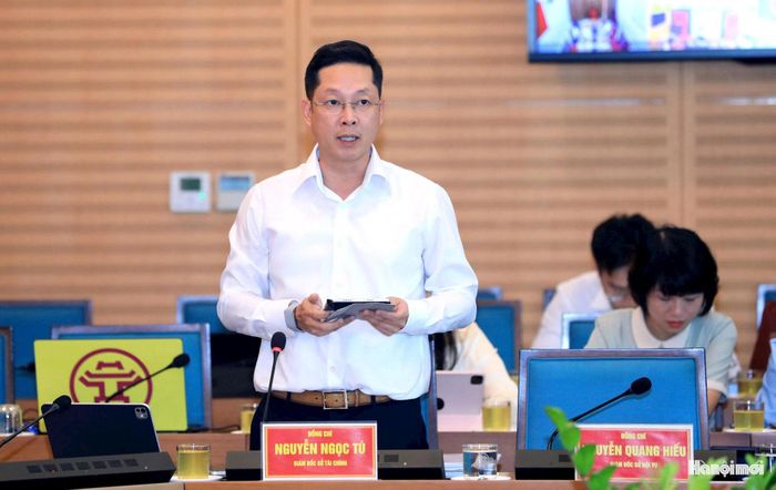 Giám đốc Sở Tài chính Hà Nội Nguyễn Ngọc Tú báo cáo. Ảnh: Viết Thành