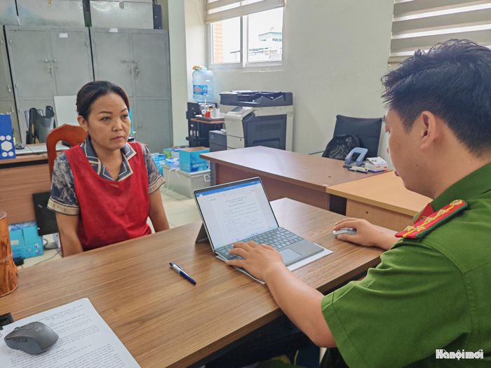 Đối tượng Nguyễn Thị Kim Sang tại cơ quan điều tra. Ảnh: Đ.T