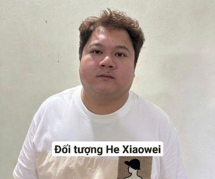Đối tượng He Xiaowei. Công an Hà Nội.