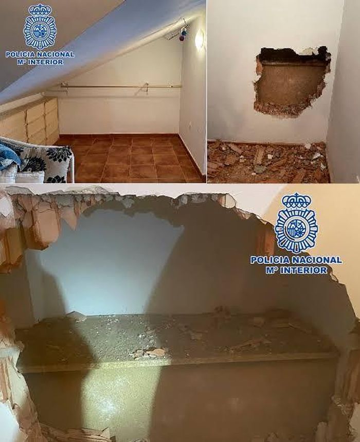 Thi thể được tìm thấy sau bức tường của căn hộ. Ảnh: Policía Nacional