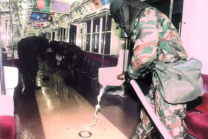  Xử lý hiện trường sau vụ tấn công của Aum. Ảnh: OPCW 