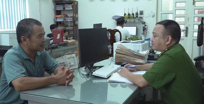 Đỗ Thanh Bình tại cơ quan công an (ảnh: CACC)