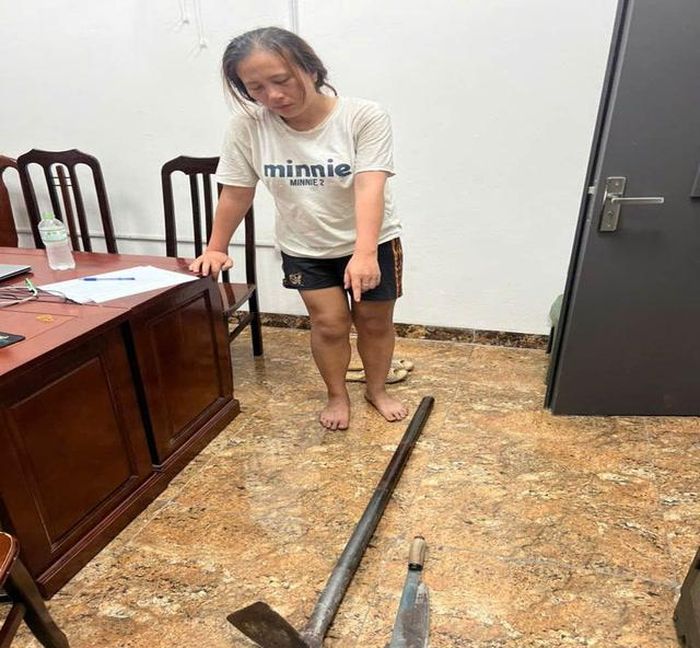 Đối tượng Nguyễn Thị Thu Hằng tại cơ quan công an. Ảnh: CAHN