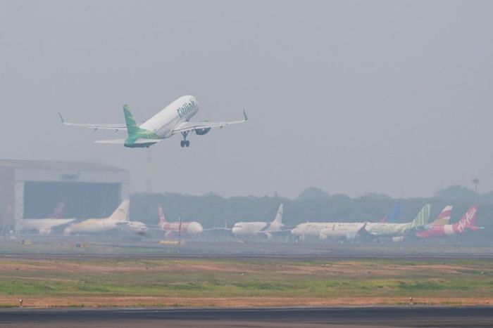  Sân bay quốc tế Soekarno-Hatta đã hoạt động trở lại sau khi tạm thời đóng cửa vì núi lửa. Ảnh: Reuters.