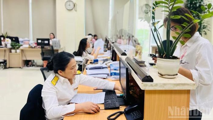 Đẩy nhanh giải quyết thủ tục, giảm thời gian và chi phí tuân thủ cho người nộp thuế. (Ảnh: MINH PHƯƠNG)