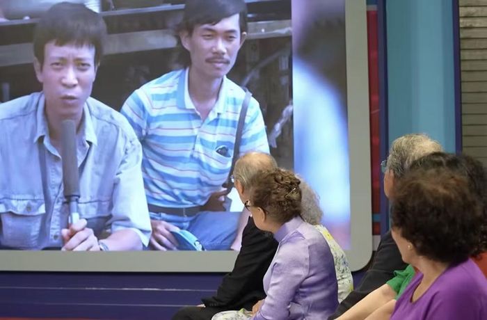 Nhà báo Lại Văn Sâm trong những thước phim cũ. Ảnh: VTV