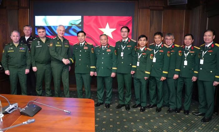 Các đại biểu chụp ảnh chung. (Ảnh: Thu Trang/Vietnam+)