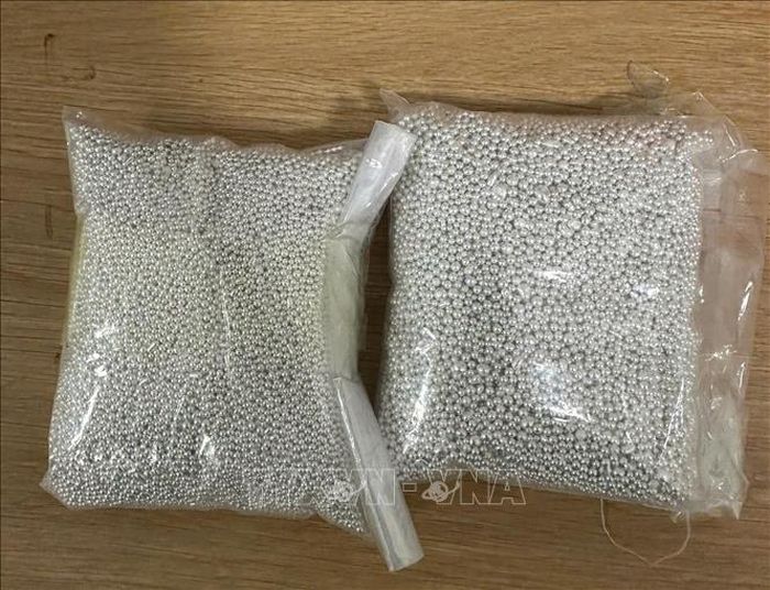 Số bạc bị lực lượng chức năng thu giữ. Ảnh: TTXVN phát