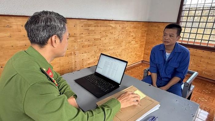 Đối tượng Nguyễn Viết Trường tại cơ quan công an - (ảnh Bộ Công an).
