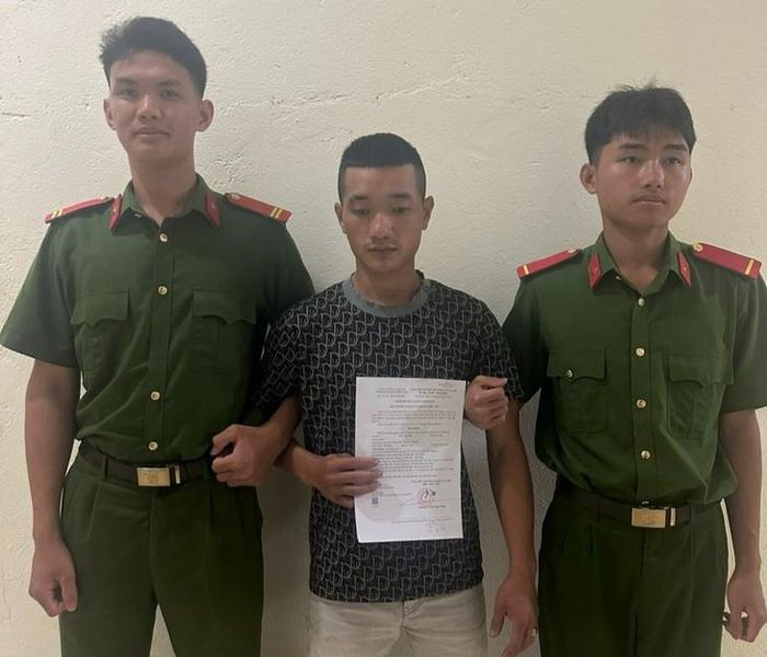 Trần Văn Tiến tại cơ quan công an. Ảnh: CALĐ.