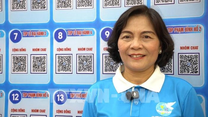 Bà Đỗ Thị Phúc, cán bộ Ủy ban MTTQ Việt Nam phường Hai Bà Trưng đồng tình chủ trương thực hiện quy hoạch sông Hồng. Ảnh: Hùng Mạnh - TTXVN.