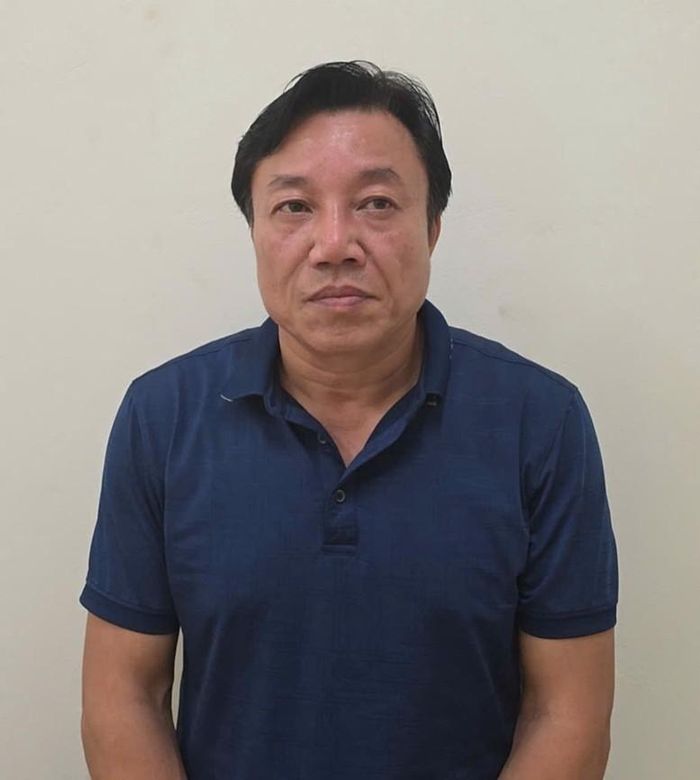Bị can Lê Đình Thanh Sơn (trái) và bị can Nguyễn Huy Ngọc (phải) - Ảnh: BCA