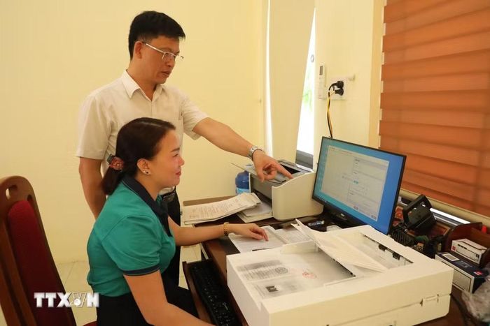 Xã Tượng Lĩnh đã scan được 954/979 hồ sơ Đảng viên, đạt 100% theo số lượng quy định được số hóa. (Ảnh: Khiếu Tư/TTXVN)