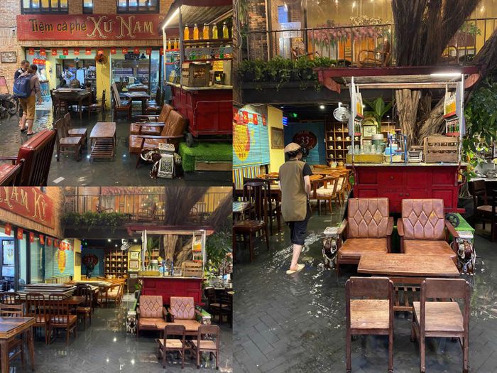Nước ngập tràn vào Tiệm cà phê Xứ Nam Kỳ trên đường D5, phường Thạnh Mỹ Tây trong tối 10/9.