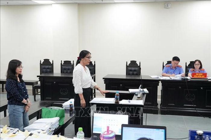 Hai bị cáo tại phiên tòa phúc thẩm.