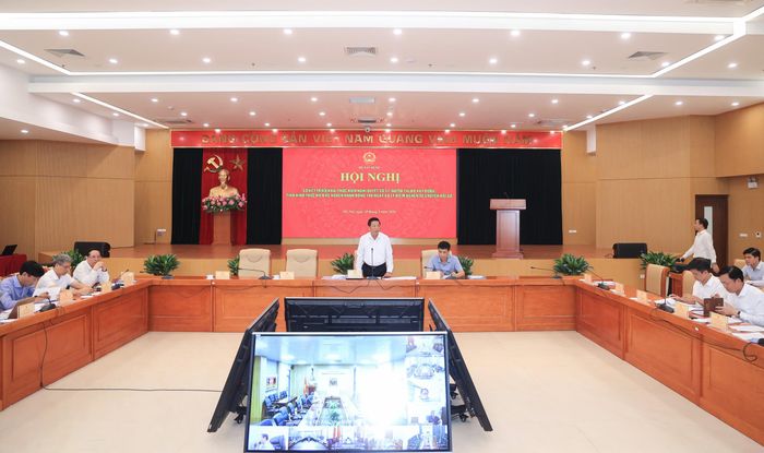 Quang cảnh Hội nghị sơ kết tình hình triển khai thực hiện Nghị quyết số 57-NQ/TW của Bộ Chính trị và Kế hoạch hành động 100 ngày xử lý điểm nghẽn về chuyển đổi số của Bộ Xây dựng. (Ảnh: Tạ Hải).