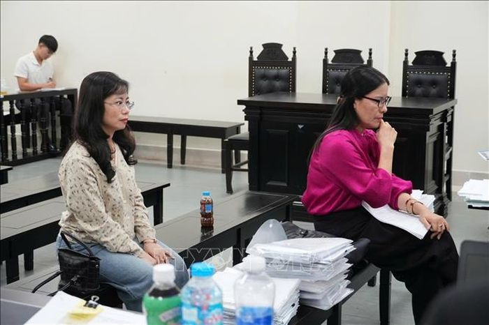 Hai bị cáo tại phiên tòa phúc thẩm.