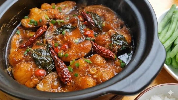 Đun tới khi cá sánh lại, nước keo vào. Ảnh minh họa.