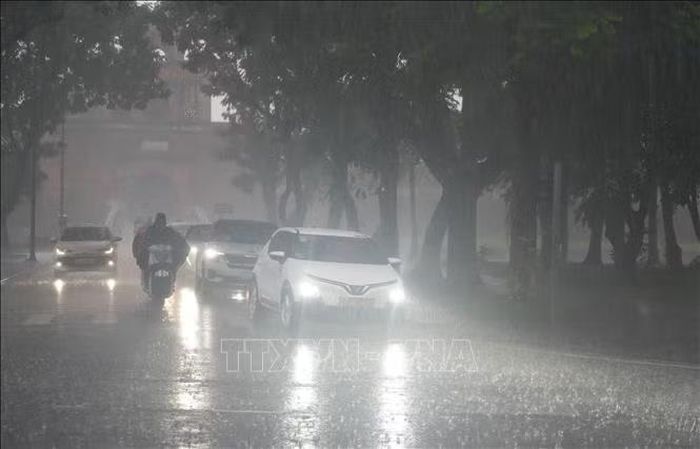 Áp thấp nhiệt đới đổi hướng về Trung Lào, miền Trung mưa rất lớn. Ảnh minh họa: Nguyên Lý/TTXVN