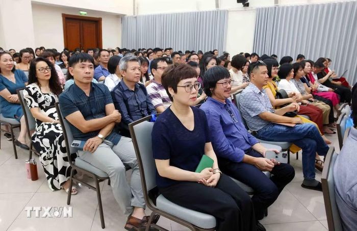 Đảng viên thuộc Đảng bộ Thông tấn xã Việt Nam tham dự Hội nghị trực tuyến tại điểm cầu trụ sở Thông tấn Quốc gia (5 Lý Thường Kiệt, Hà Nội). (Ảnh: Phạm Kiên/TTXVN)