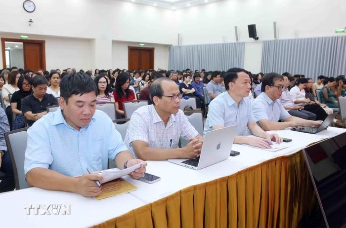 Đảng viên thuộc Đảng bộ Thông tấn xã Việt Nam tham dự Hội nghị trực tuyến tại điểm cầu trụ sở Thông tấn Quốc gia (5 Lý Thường Kiệt, Hà Nội). (Ảnh: Phạm Kiên/TTXVN)