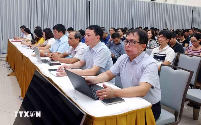Đảng viên thuộc Đảng bộ Thông tấn xã Việt Nam tham dự Hội nghị trực tuyến tại điểm cầu trụ sở Thông tấn Quốc gia (5 Lý Thường Kiệt, Hà Nội). (Ảnh: Phạm Kiên/TTXVN)