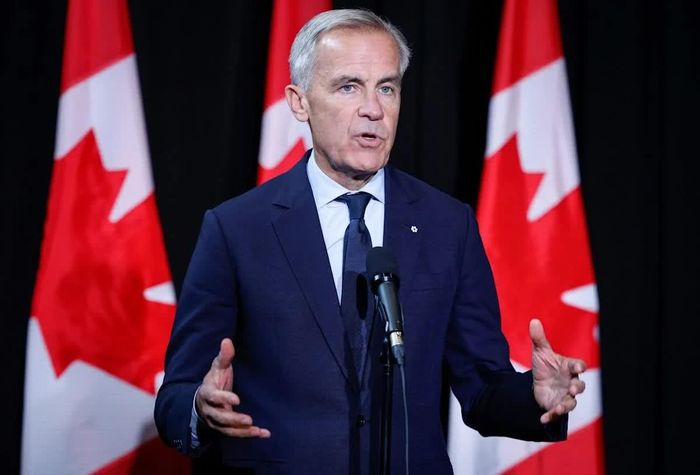 Thủ tướng Canada Mark Carney phát biểu trước giới truyền thông tại một cuộc họp kín của nội các ở Banff, Alberta, vào ngày 10 tháng 9. Ảnh: TCP.