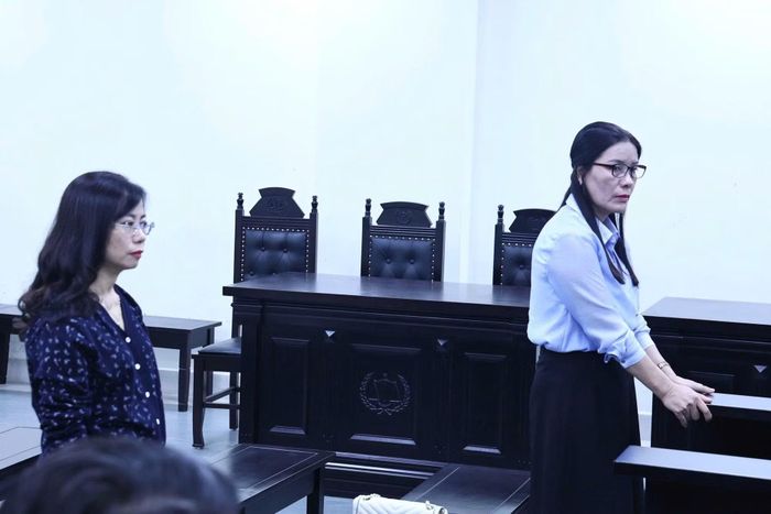 Hai bị cáo Bình và Nguyệt tại phiên tòa phúc thẩm.