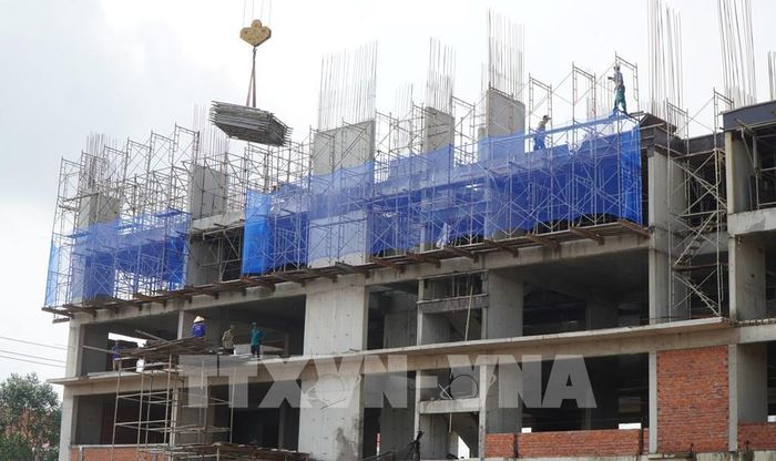 Khối chung cư A1 với 252 căn hộ đang triển khai thi công. Ảnh: Nhựt An - TTXVN