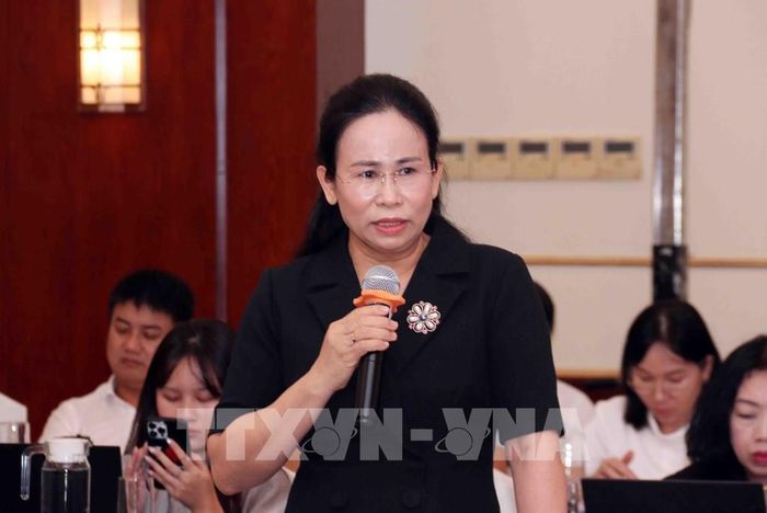 Bà Đỗ Thị Hoàng Yến, Thẩm phán Tòa án Nhân dân Tối cao, góp ý Luật Đật đai (sửa đổi) tại Hội thảo. Ảnh: Xuân Khu-TTXVN