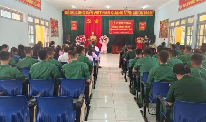 Quang cảnh buổi lễ ký kết giao ước kết nghĩa. Ảnh: N.T