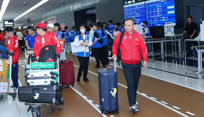 Trưởng đoàn Nguyễn Hồng Minh dẫn đầu đoàn TTVN đến Nagoya (Nhật Bản) chuẩn bị cho Asiad 20 (ảnh B.L)