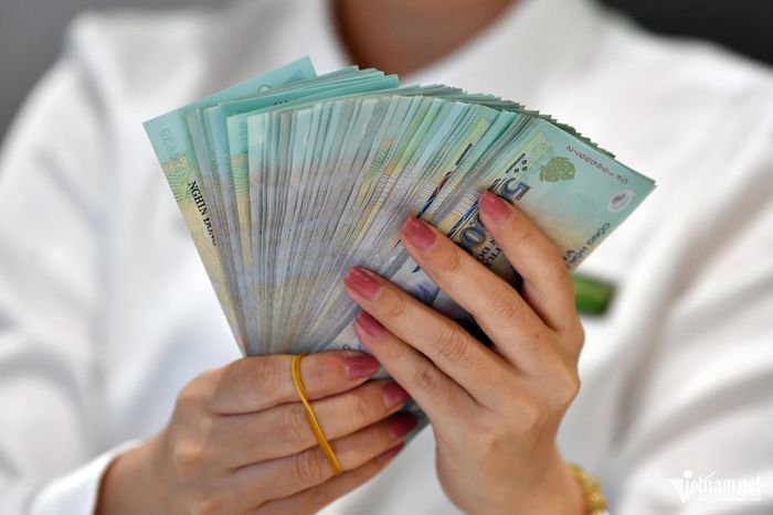 Nghỉ việc rồi mới được trả lương tháng trước, tính thuế TNCN 10% hay lũy tiến? Ảnh minh họa: Nam Khánh