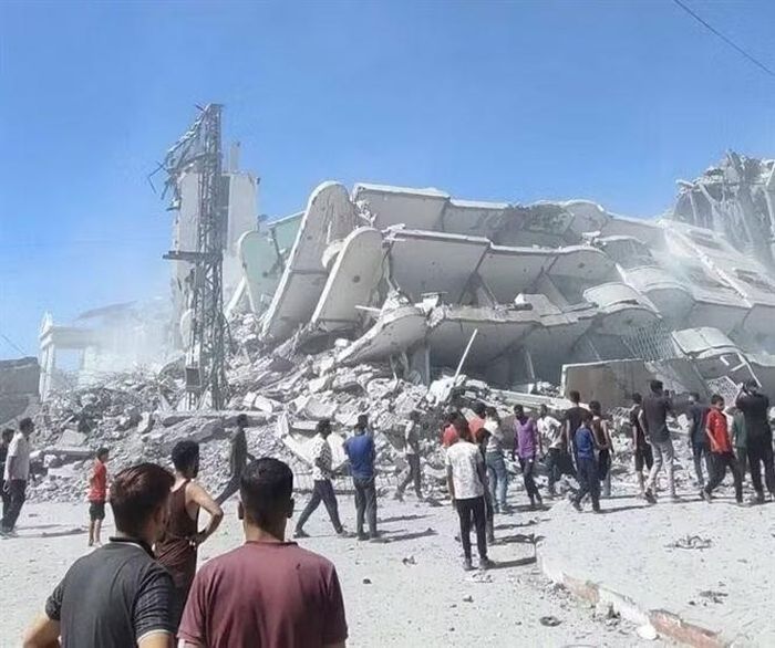 Tòa nhà bị phá hủy sau các cuộc không kích của Israel xuống Dải Gaza. Ảnh: IRNA/TTXVN