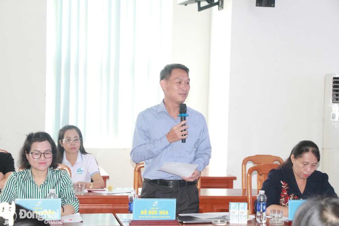 Thành ủy viên, Phó Trưởng ban Tổ chức Thành ủy Đỗ Đức Hòa trao đổi tại hội thảo. Ảnh: Nga Sơn