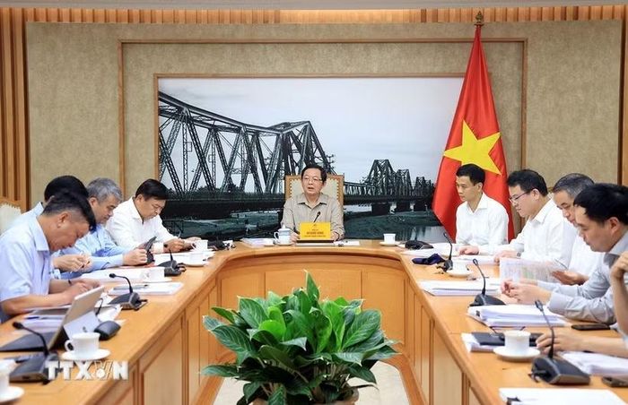 Phó Thủ tướng Hồ Quốc Dũng chủ trì cuộc Họp về việc tháo gỡ khó khăn, vướng mắc của Công ty cổ phần đóng tàu Thái Bình Dương. (Ảnh: Tuấn Anh/TTXVN)
