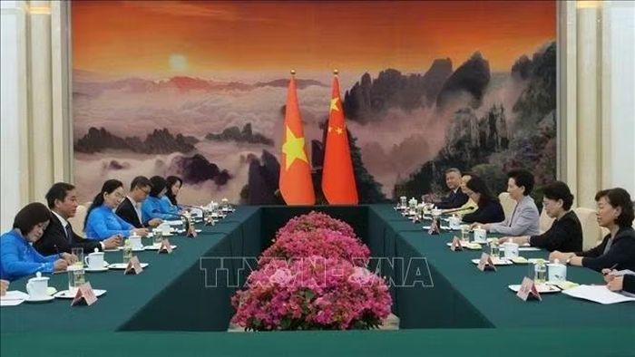 Quang cảnh buổi làm việc giữa đại diện Hội Liên hiệp Phụ nữ Việt Nam và Hội Liên hiệp Phụ nữ Toàn quốc Trung Hoa. Ảnh: Quang Hưng/PV TTXVN tại Trung Quốc