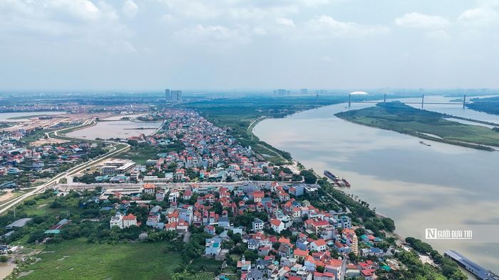 Trong ảnh là khu dân cư Hải Bối thuộc xã Vĩnh Thanh. Dự kiến 1 phần khu dân cư này sẽ phải di dời theo quy hoạch phòng, chống lũ.