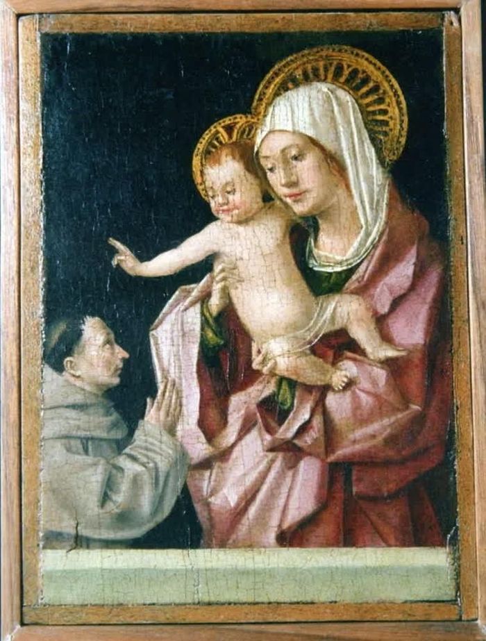 5 bức tranh còn lại trong bộ Polittico di San Gregorio của Antonello, trong đó có ba bức bị đánh cắp tháng 8 (bên trái) và tác phẩm nhỏ thứ tư bị lấy đi khắc họa Đức Mẹ và Chúa Hài Đồng (bên phải). Ảnh: Museo Regionale Accascina Messina/Reuters.