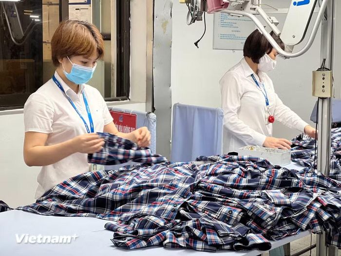Thị trường ngoại hối và lãi suất Việt Nam vẫn duy trì sự ổn định nhằm hỗ trợ doanh nghiệp. (Ảnh: Vietnam+)