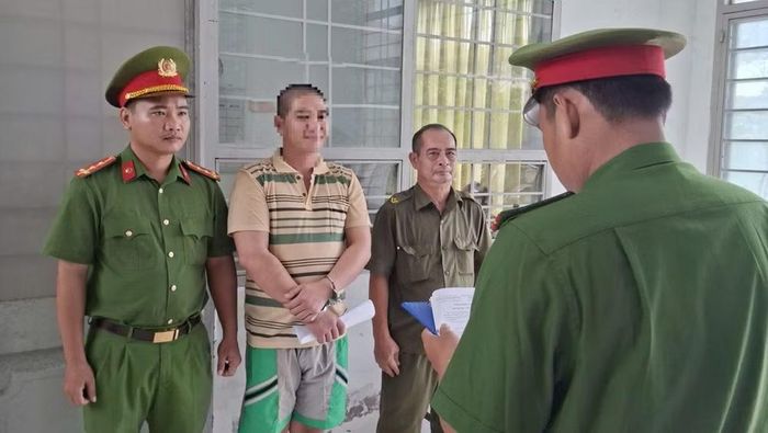 Cơ quan Công an thi hành lệnh đối với Nguyễn Dương Tuấn Hải. Ảnh CACC